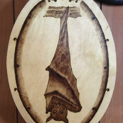 oval hanging bat wood burned art