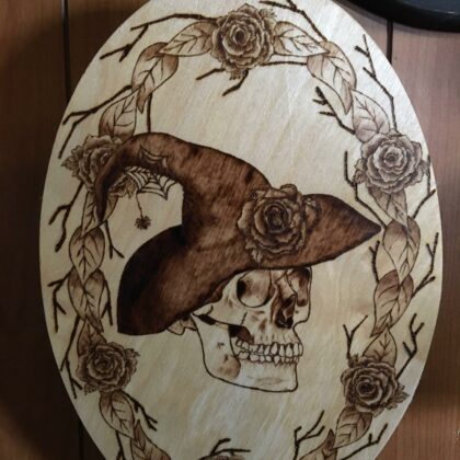 skull witch hat oval wood burned art