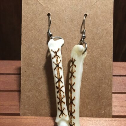 coyote paw bone earrings stitches pyrography