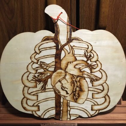 pumpkin-shaped wooden wall decor anatomical heart ribs arteries pyrography wood burning