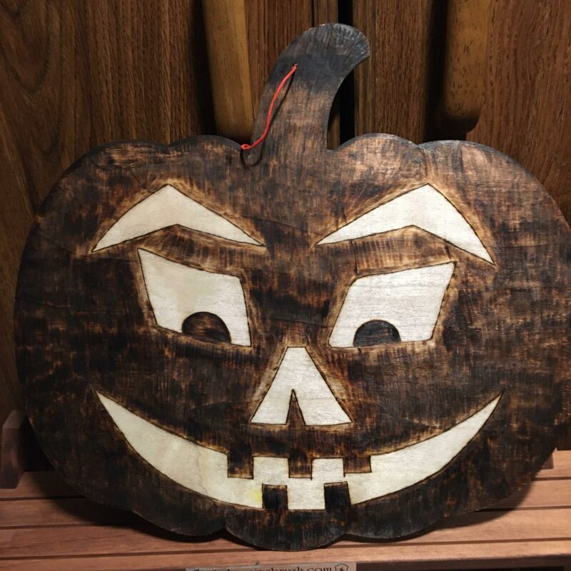 pumpkin-shaped wooden wall decor jack-o-lantern pyrography wood burning