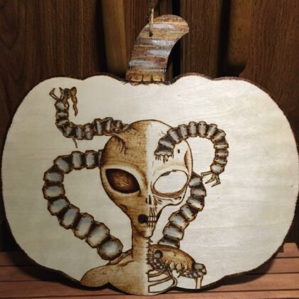 pumpkin-shaped wooden wall decor alien skull biomechanical parasite pyrography wood burning