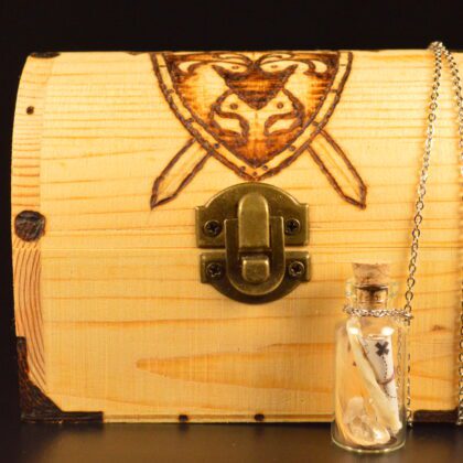 treasure chest shield swords vial necklace seashell wood burning pyrography